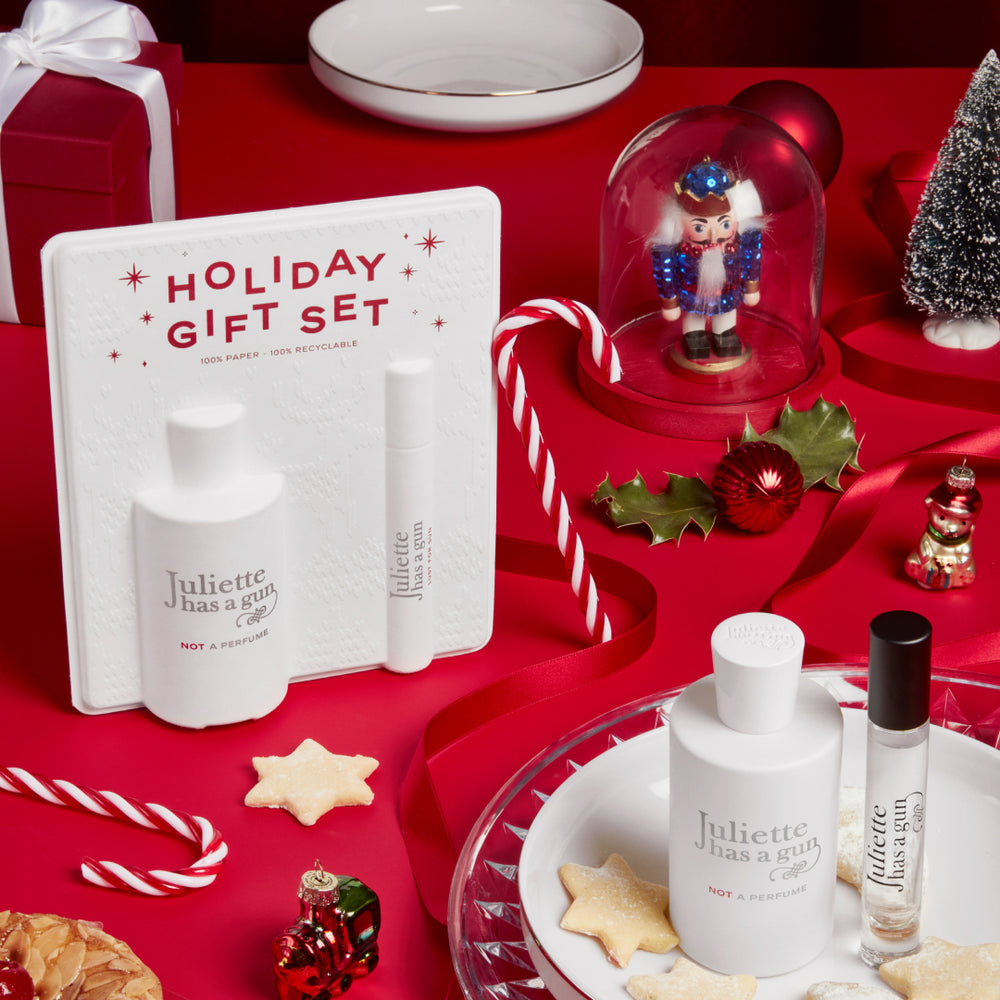Holiday Gift Set 2023 on a Christmas table Juliette has a gun