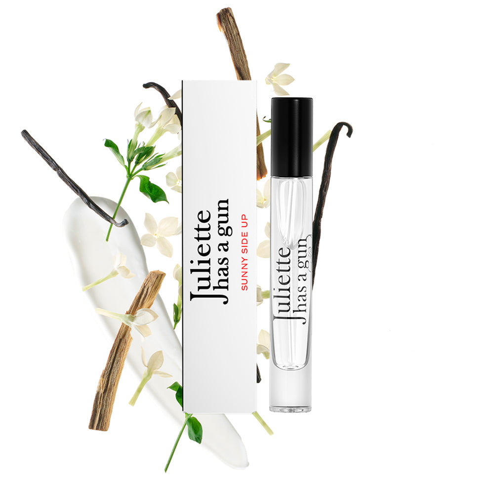 Sunny Side Up by Juliette has a gun travel spray packshot with ingredients 